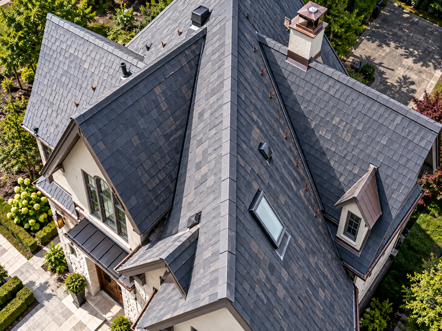 Aerial view of a steep multi-slope residential roof